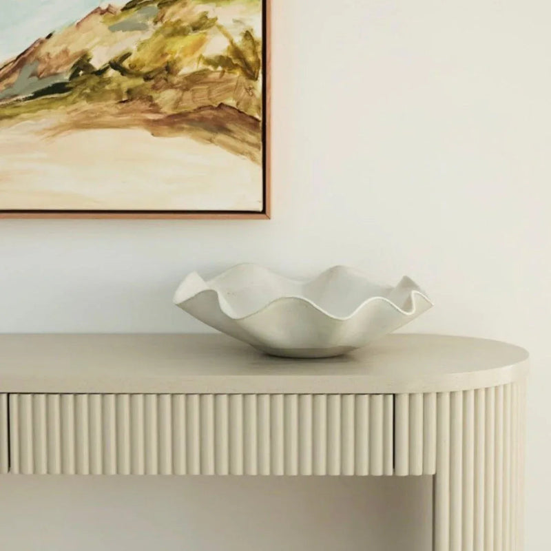 Customer photo of the large white wave bowl in a home setting
