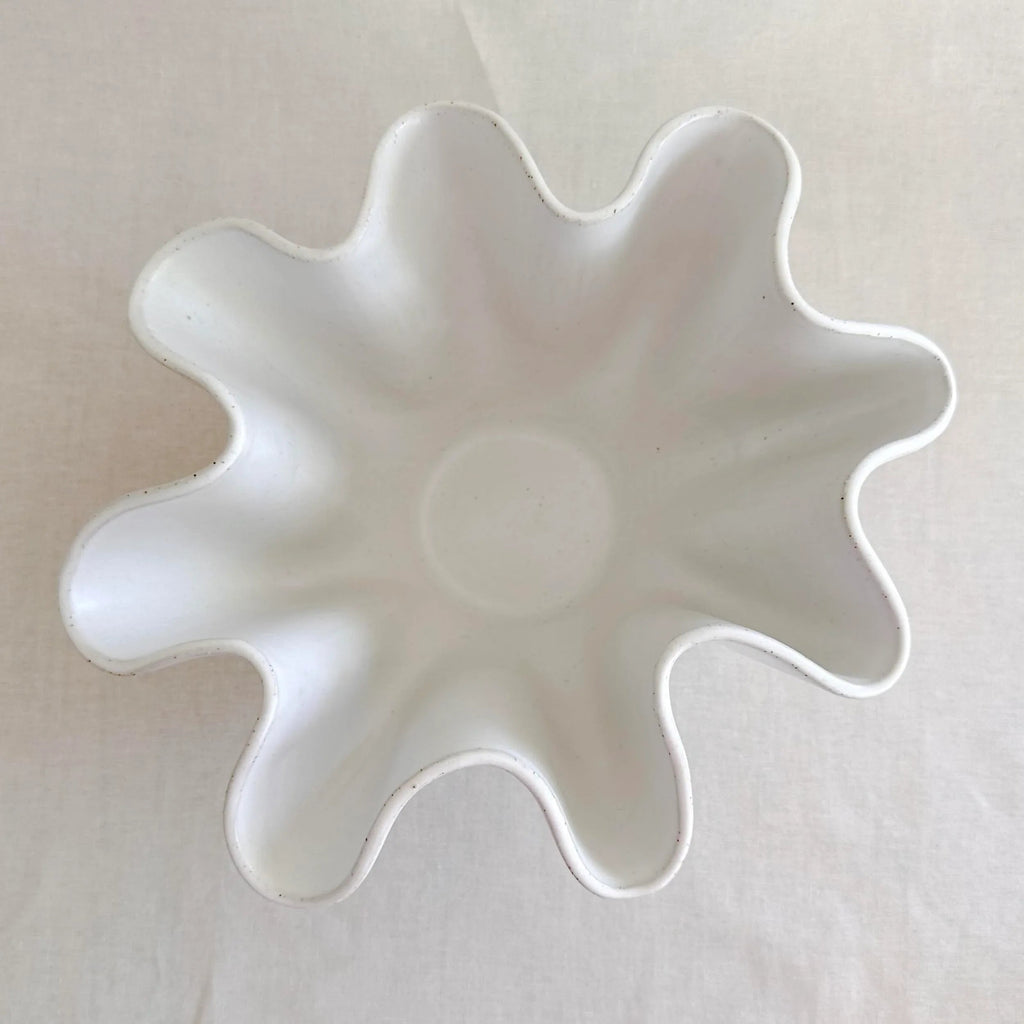 Top-down view of the large white high sided wave bowl showing wave rim detail